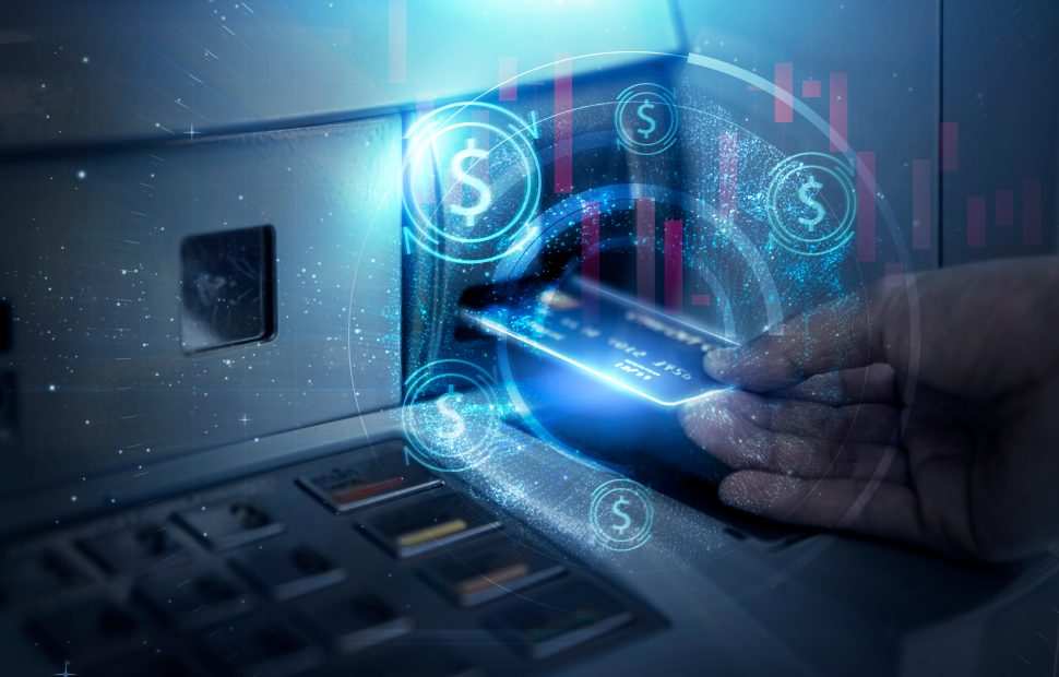 Customer using a reverse ATM kiosk to convert cash into a prepaid card, symbolizing the shift toward cashless payments powered by ATM Advantage